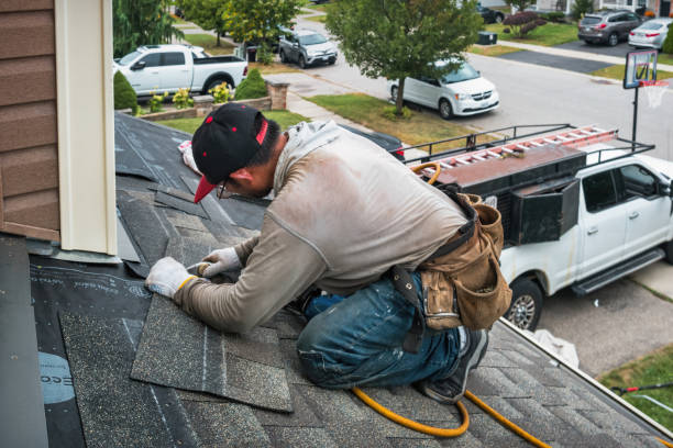 Professional Roofing technician working in Clemons, IA